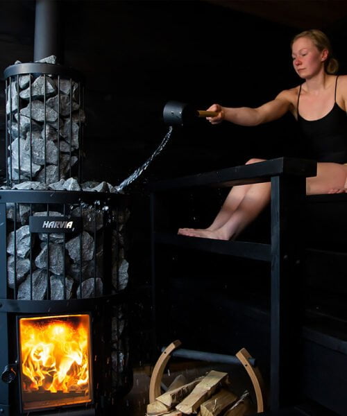 Woman Enjoying Harvia Legend Wood Burning Sauna Cabin