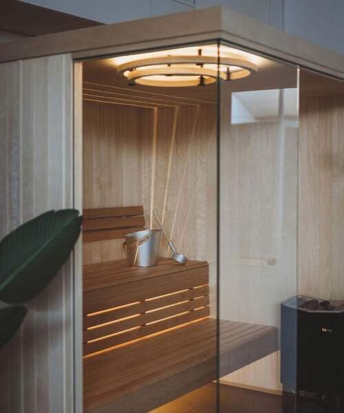 Tylo Silhouette Ring sauna lights installed in traditional sauna